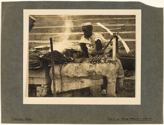 Alternate image of Cooking food on the steps of Jama Masjid by Godfrey Tanner