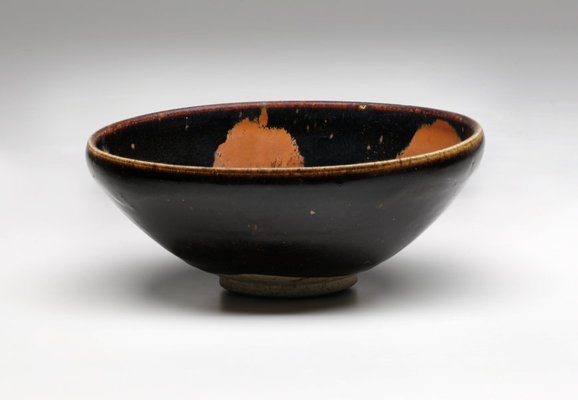 Alternate image of Bowl with iron-brown streaks on black glaze by Henan Blackware
