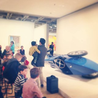 James Angus' Bugatti Type 35 is my favourite sculpture in the Gallery's collection. It is a life-sized replica of a real car, but manufactured on a 30 degree tilt. It's also my two-year-old son Aubrey's absolute favourite thing in the world. Here he is helping me give a talk at the Gallery.