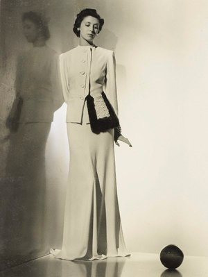 Alternate image of recto: Untitled (measuring tool photo-montage)
verso: Untitled (woman in white skirt suit with fur trim looking at ball) by Max Dupain