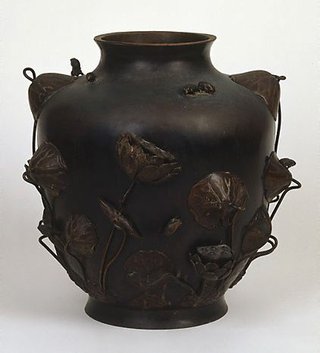 AGNSW collection Meiji export ware Large vase decorated with sculptured lotus and frogs and incised water pattern and water plants 19th century
