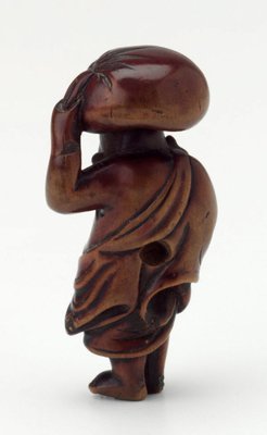 Alternate image of Netsuke in the form of Daikoku carrying a sack on his head by 
