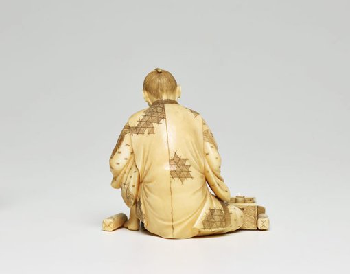Alternate image of Figure of a seated miller grinding grain (okimono) by Sōya