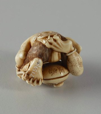 Alternate image of Netsuke in the form of a demon chanting a Buddhist sutra by 