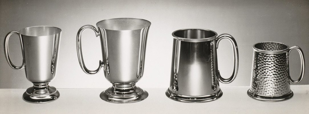 Alternate image of recto top: Untitled (table setting with candle)
recto bottom: Untitled (metals mugs) by Max Dupain