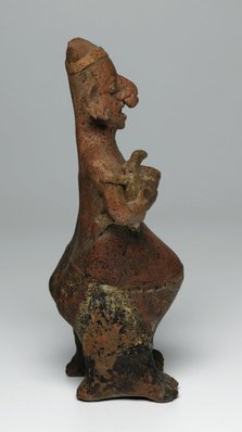 Alternate image of Pottery figure (Standing woman holding a child in one arm and a bowl in the other) by 