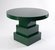 	Table

	
		Engineered wood-fibre board, high-gloss lacquer finish based on a 1920s racing car green
		Handcrafted by Luke James, Art Gallery of NSW carpenter 
		73 × 100 cm diameter
	